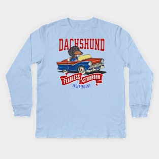 Funny and Cute Doxie Dachshund dog in a classic vintage retro car with red white and blue banner flags Kids Long Sleeve T-Shirt